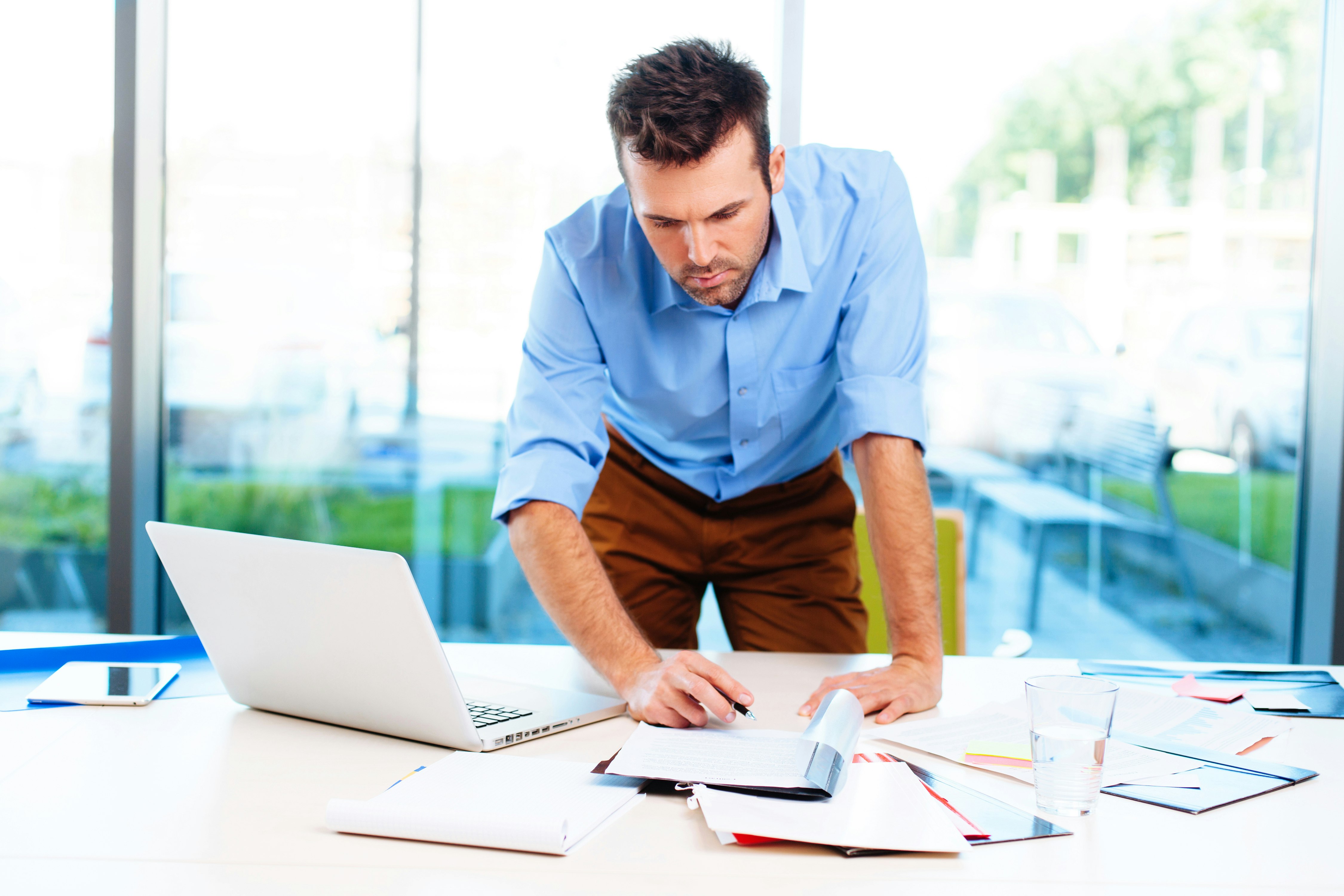 Busy businessman working in office