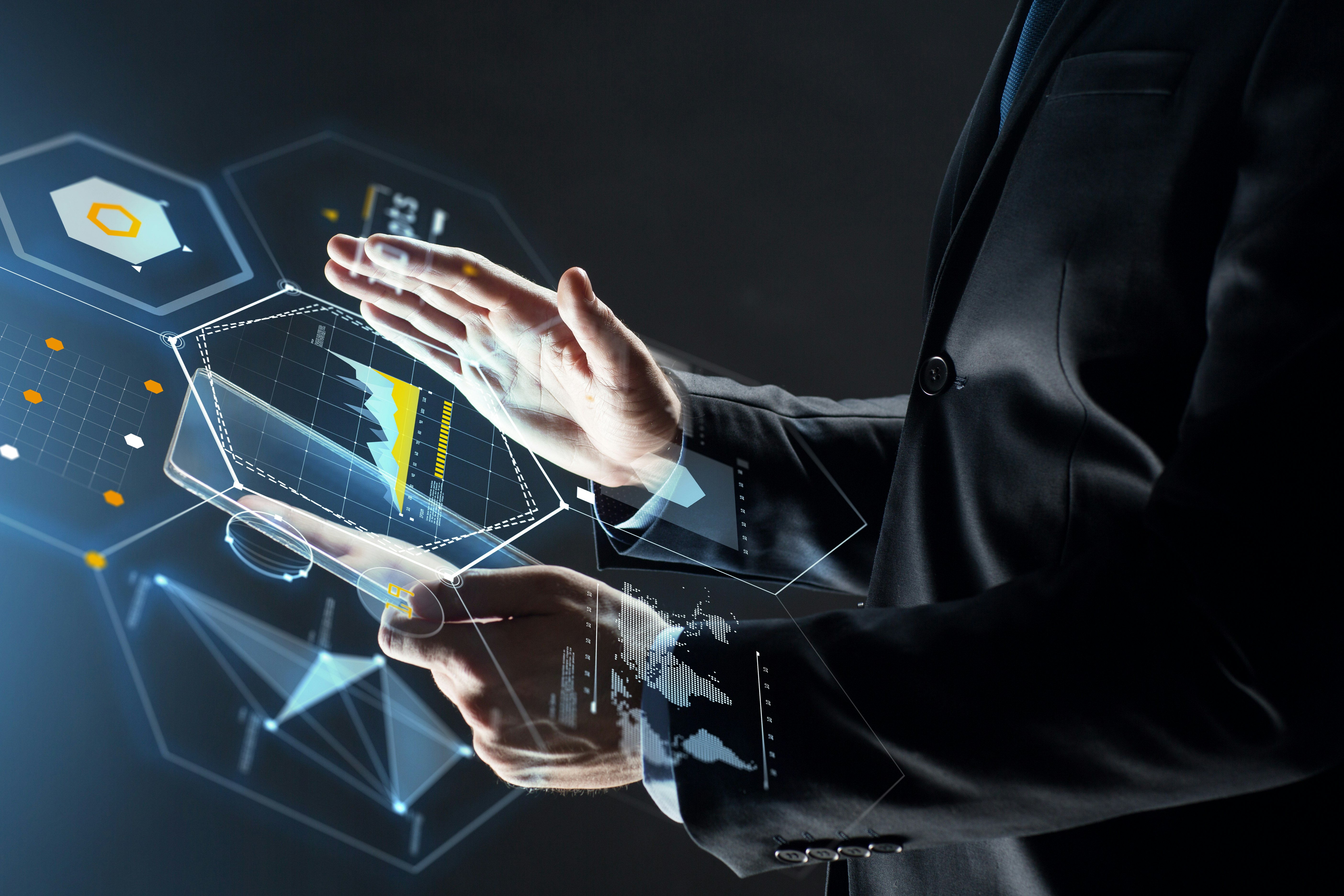 business, people and future technology concept - close up of businessman hands with transparent tablet pc computer and virtual screen projection over black background